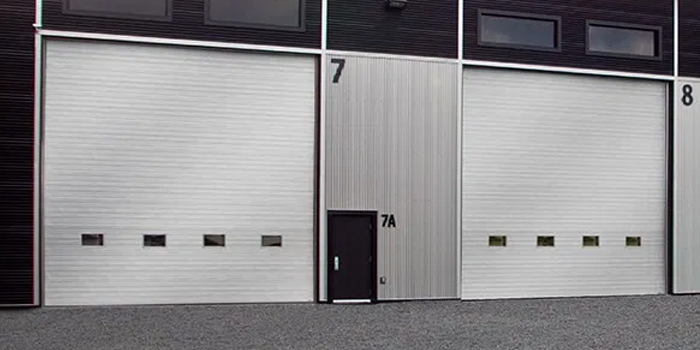 fix bent garage door in East Vancouver